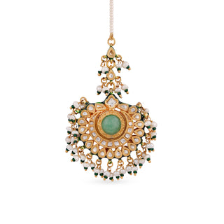 This gorgeous gold plated silver mix base maang tikka with flourite center stone and real pearls is pure elegance. 